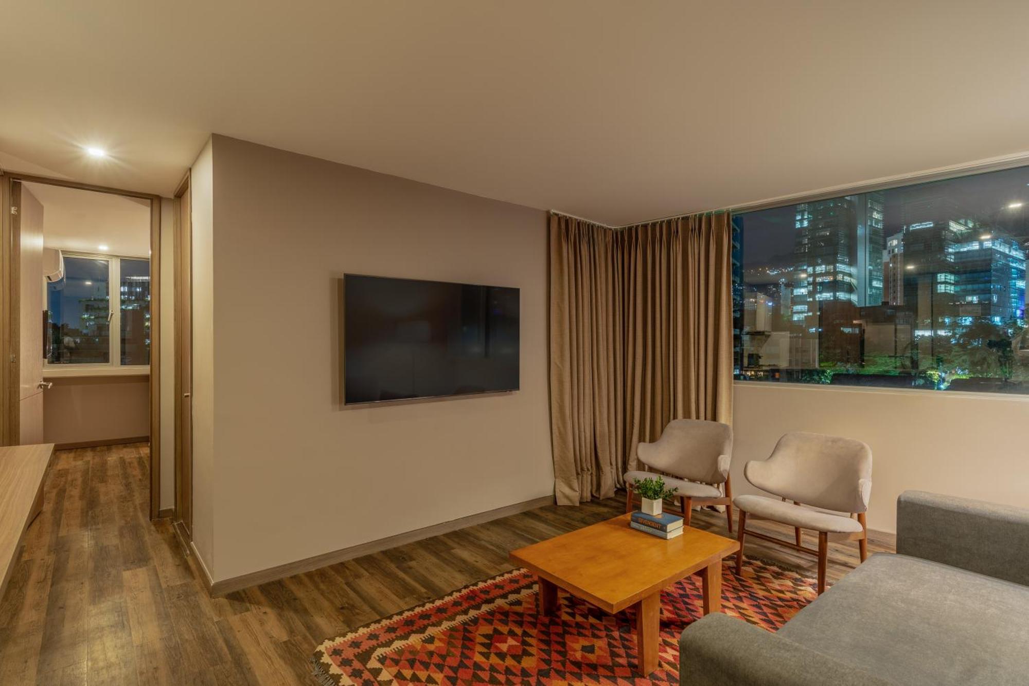 Sites Hotel Medellín Exterior foto A living room in a modern apartment