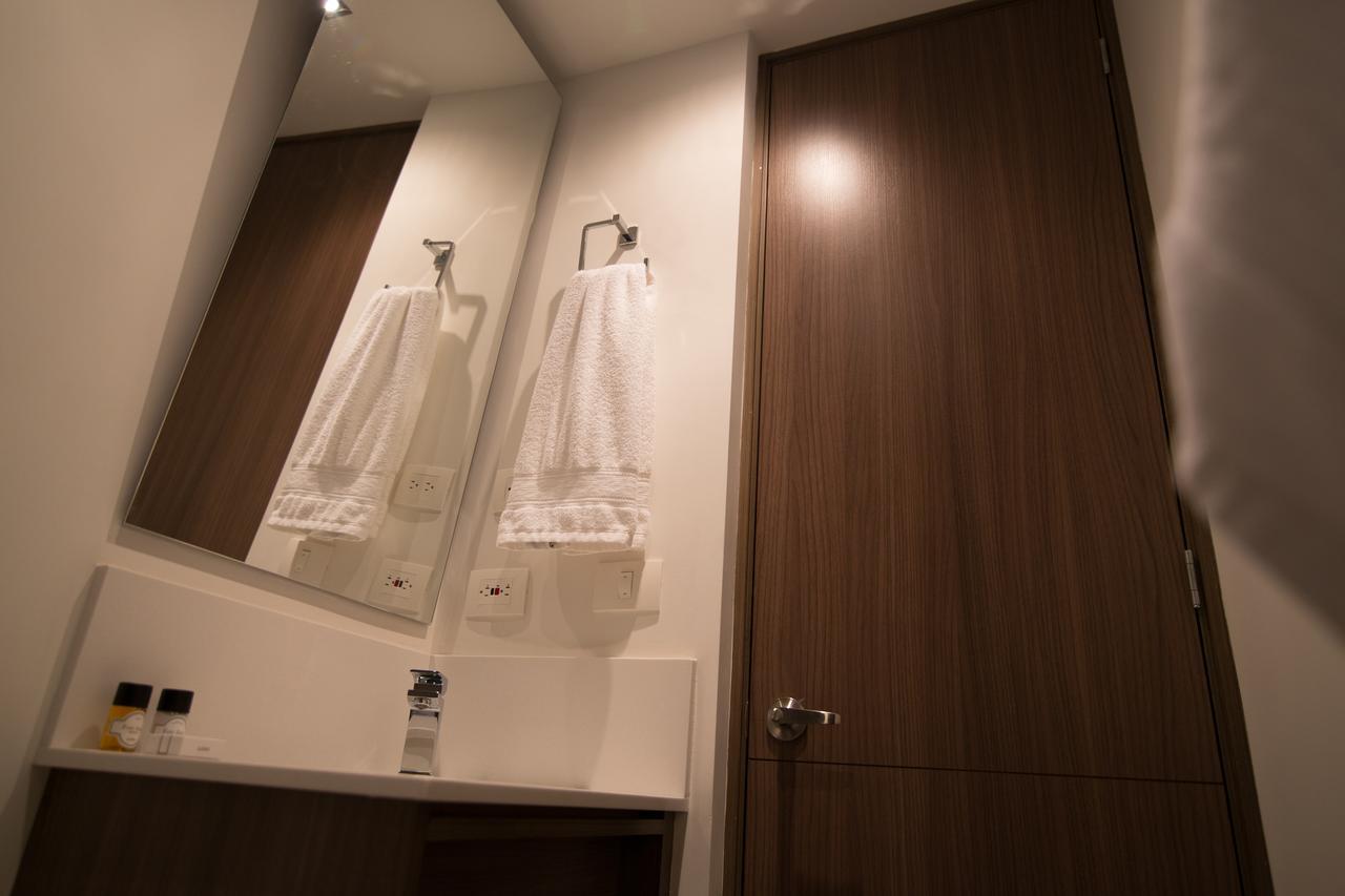 Sites Hotel Medellín Exterior foto A bathroom in a capsule hotel